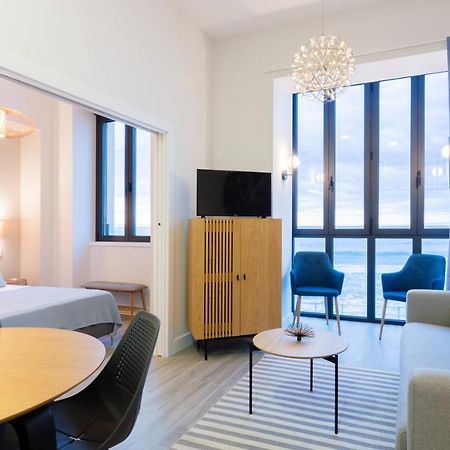 Apartamentos La Xiuca Playa Gijon Bagian luar foto