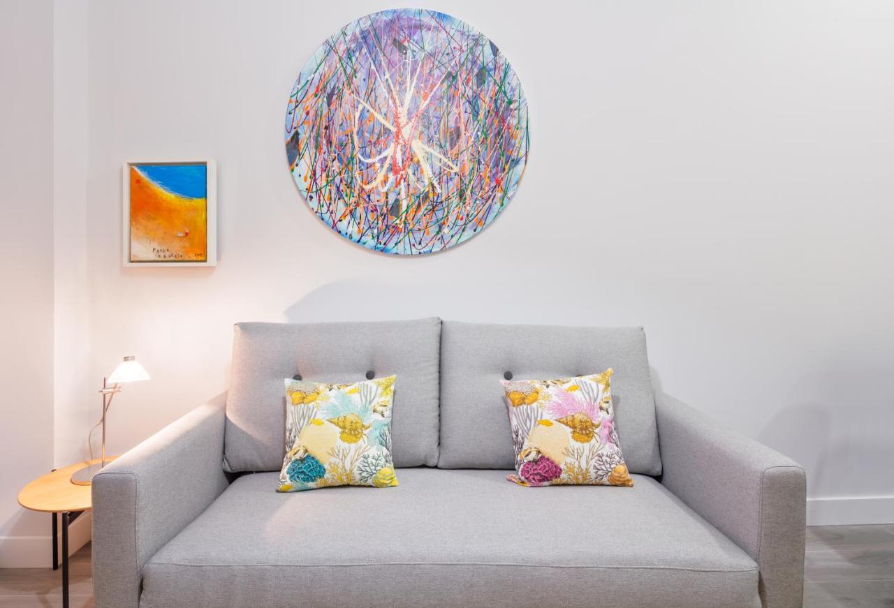 Apartamentos La Xiuca Playa Gijon Bagian luar foto