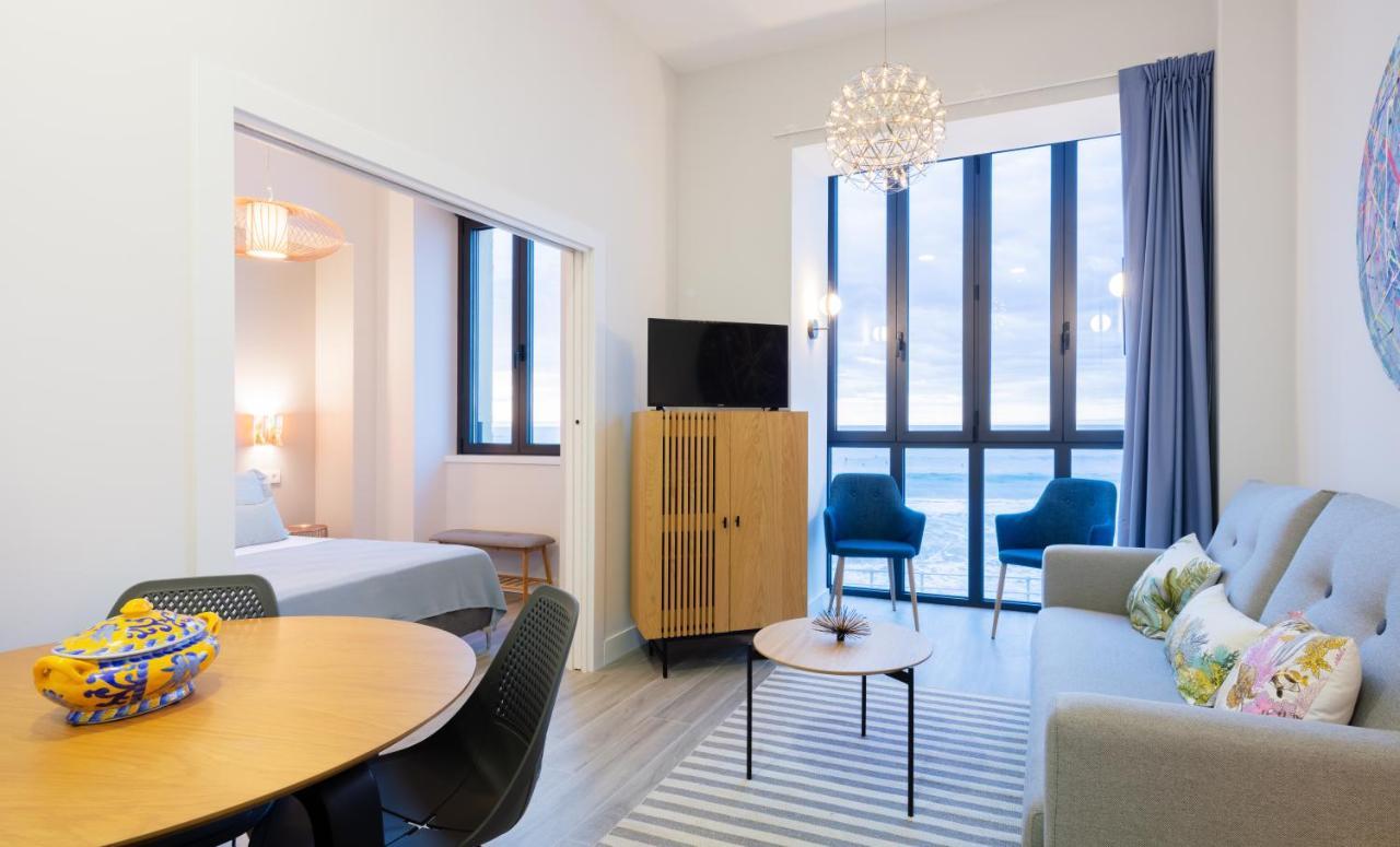 Apartamentos La Xiuca Playa Gijon Bagian luar foto