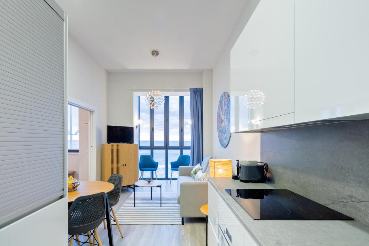 Apartamentos La Xiuca Playa Gijon Bagian luar foto