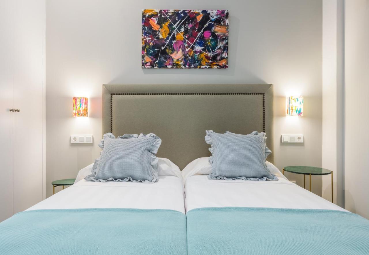 Apartamentos La Xiuca Playa Gijon Bagian luar foto