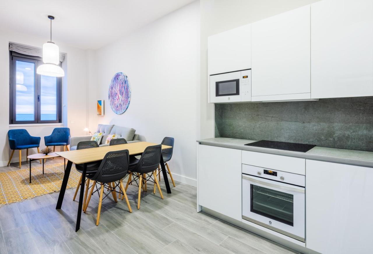 Apartamentos La Xiuca Playa Gijon Bagian luar foto